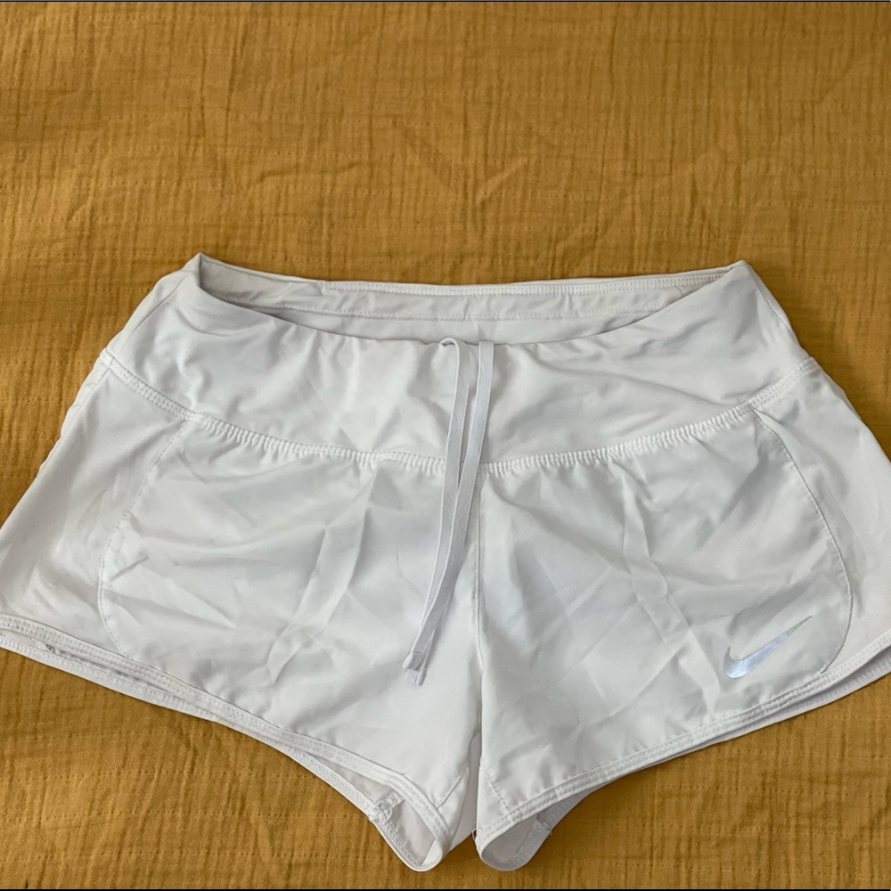 White Nike shorts